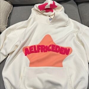 Elfric Eden  Cream Hoodie with Orange and Pink Star Design